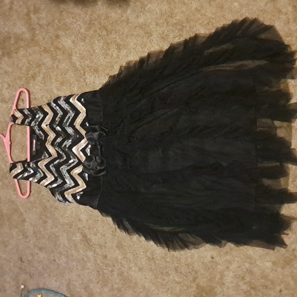 Girls dress size is 10
